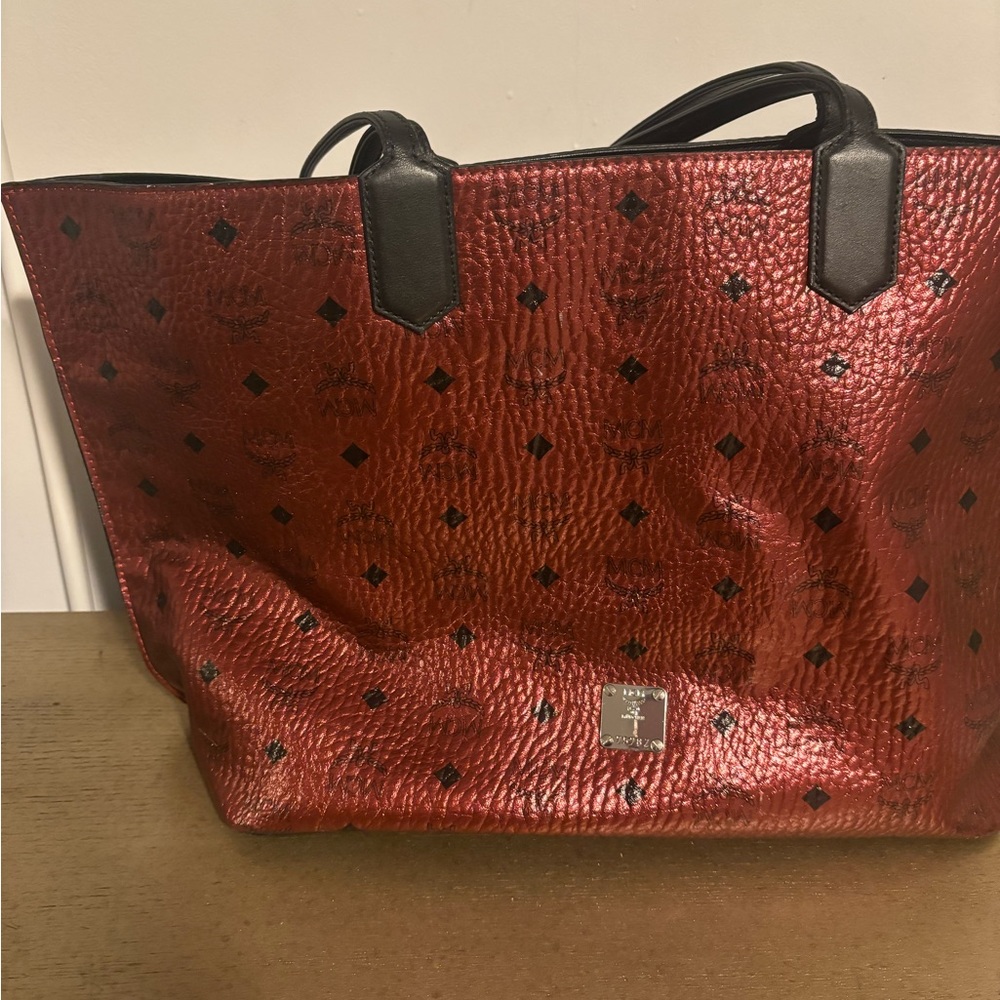 Authentic MCM burgundy shoulder bag in good condition